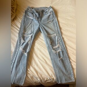 Blue American eagle jeans size 6 A LOT HOLES